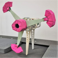 Skippy's head balancing on stilts with 3-arm crossbar